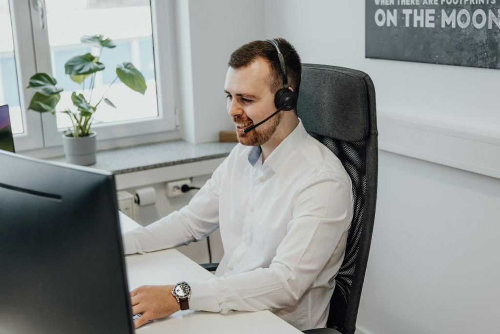 A man providing customer support