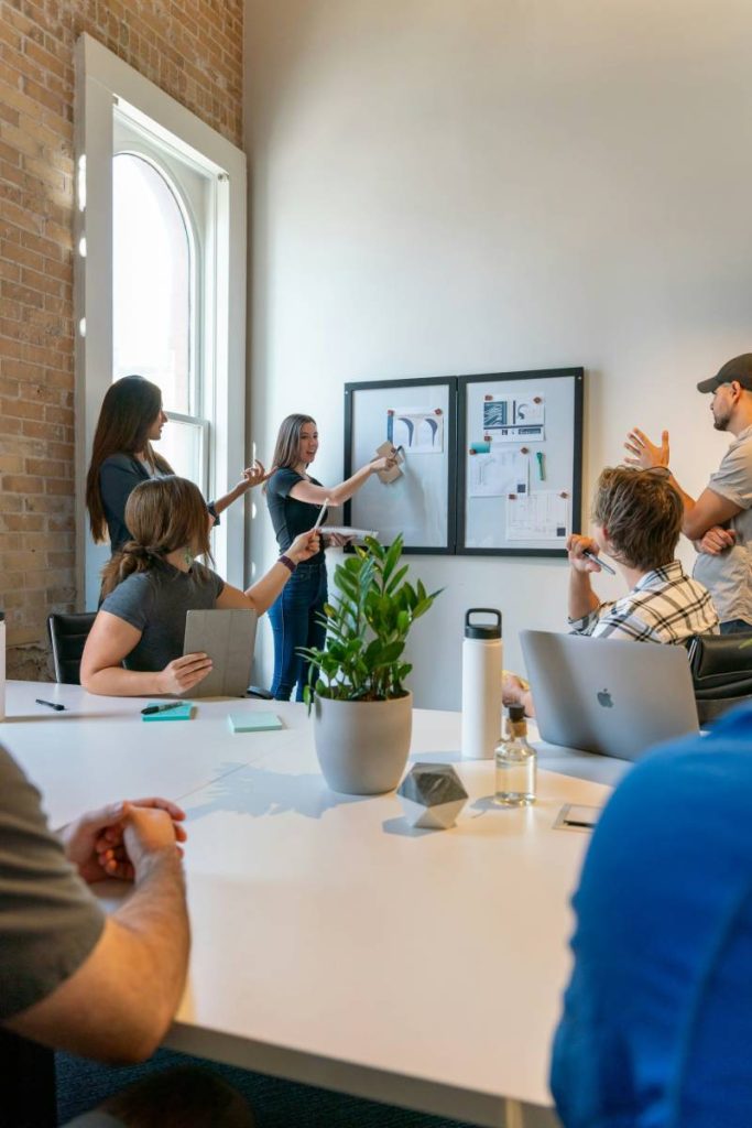 Team members discussing a client's project